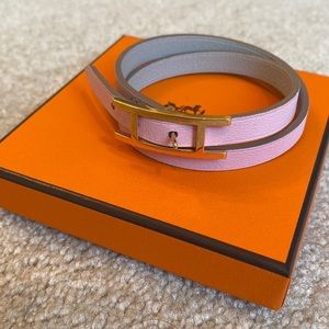 BRAND NEW light pink leather wrap bracelet with Gold buckle.